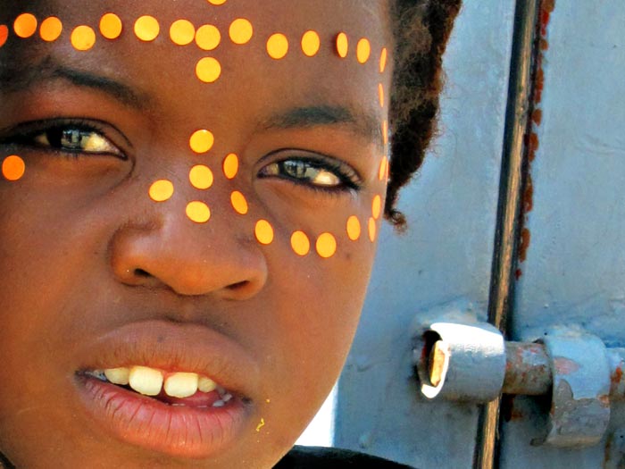 girl with orange dots